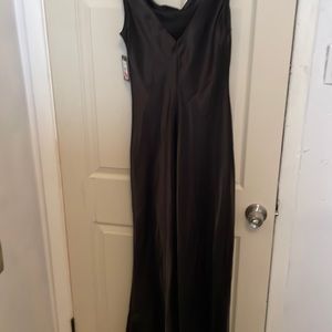 Marina dresses!! New dresses never wear it’s a size small black dress satin.